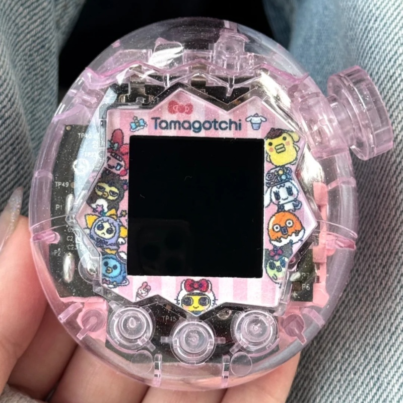 Bandai Model Tamagotchi - สินค้าขายดีใหม่ เปลี่ยนอะไหล่เคสสีชมพูและสีแดงสำหรับ Tamagotchi Paradise รุ่น Happy