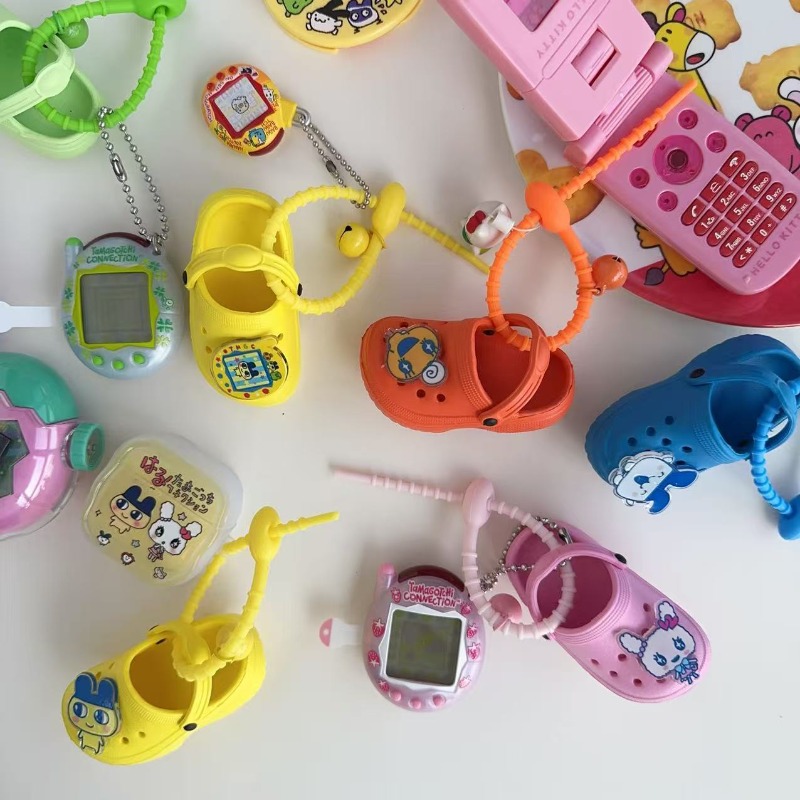 พวงกุญแจรองเท้า Tamagotchi ของ - Bandai Model Tamagotchi บทวิจารณ์และราคา